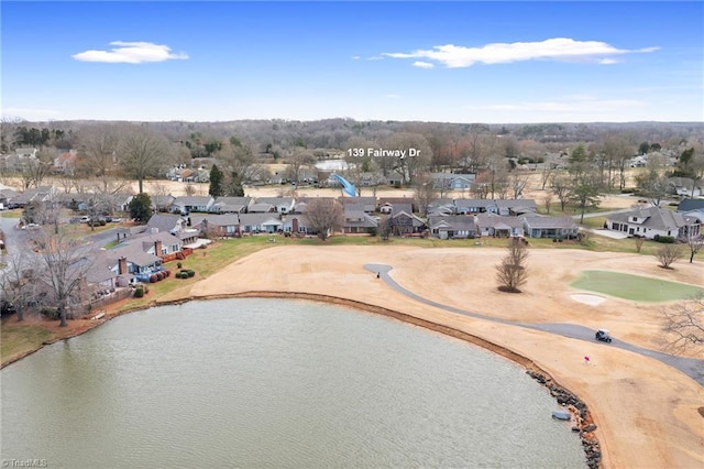 aerial view with a residential view and a water view