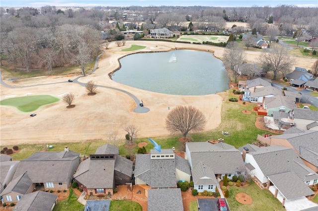 bird's eye view featuring a residential view and a water view