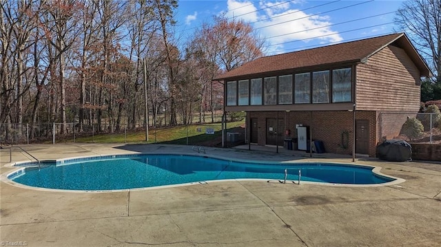 view of pool featuring a fenced in pool, a patio, and fence