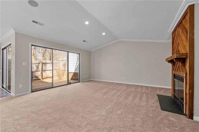 unfurnished living room with light carpet, visible vents, crown molding, and vaulted ceiling