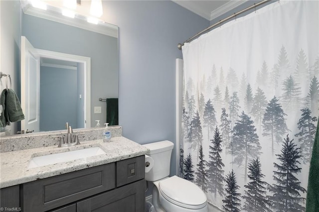 bathroom with walk in shower, ornamental molding, toilet, and vanity