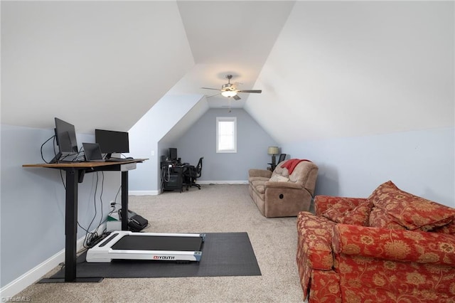 exercise area featuring carpet floors and vaulted ceiling