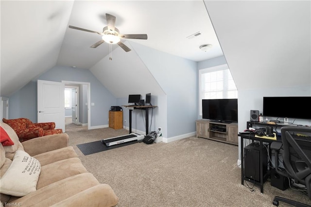 carpeted office space featuring lofted ceiling