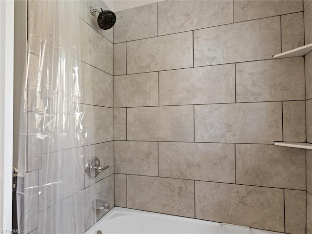 bathroom featuring shower / bath combination with curtain