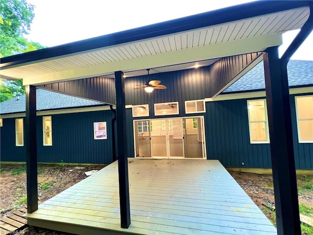 exterior space featuring ceiling fan and a wooden deck