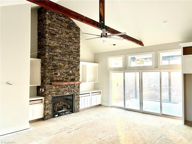 unfurnished living room featuring ceiling fan, a fireplace, beamed ceiling, and high vaulted ceiling