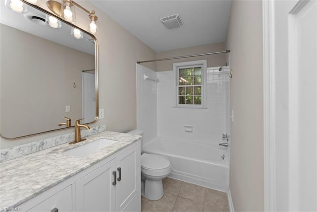 bathroom featuring toilet, vanity, tile patterned flooring, washtub / shower combination, and baseboards