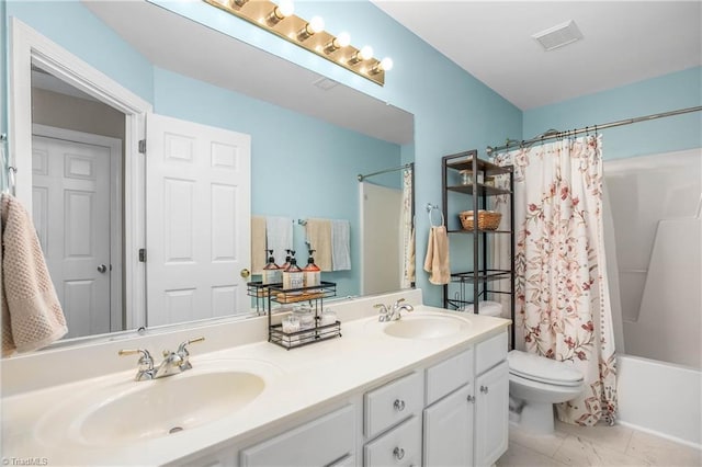 bathroom with double vanity, toilet, a sink, and shower / tub combo with curtain