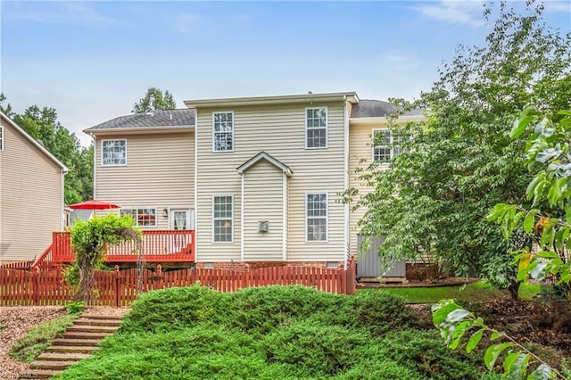 rear view of property with a deck