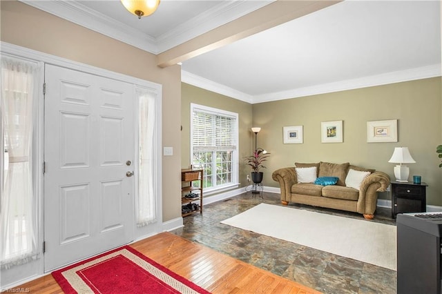 entrance foyer with ornamental molding, dark wood-style flooring, and baseboards