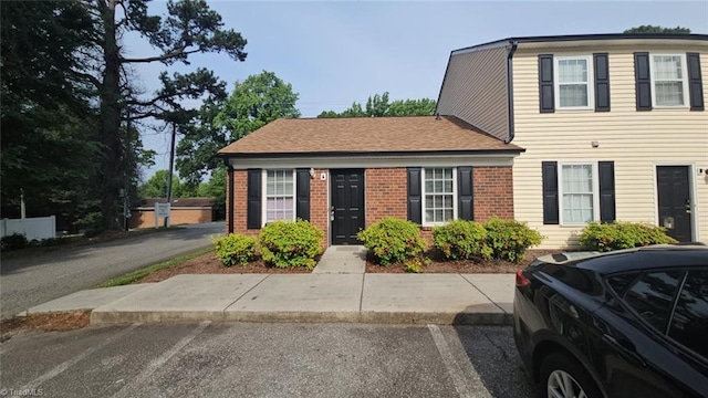 3527 Lynhaven Dr Unit A, Greensboro, NC 27406 - view of front of property featuring uncovered parking and brick siding