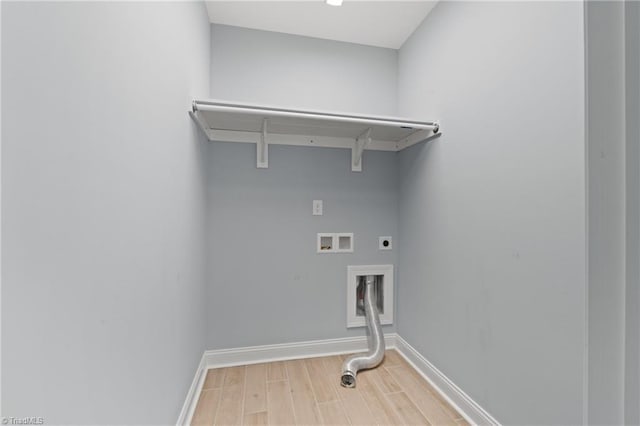 laundry area featuring hookup for a washing machine, hardwood / wood-style floors, and hookup for an electric dryer