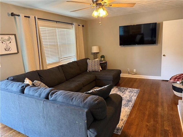 living room with ceiling fan and hardwood / wood-style floors