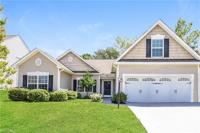 3365 Lilliefield Ln, High Point, NC 27265 - view of front facade featuring a front lawn, driveway, and a garage