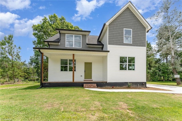 4000 Groometown Rd, Greensboro, NC 27407 - view of front of house with a front lawn, entry steps, and crawl space