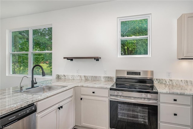 4000 Groometown Rd, Greensboro, NC 27407 - kitchen featuring stainless steel appliances, white cabinets, and open shelves