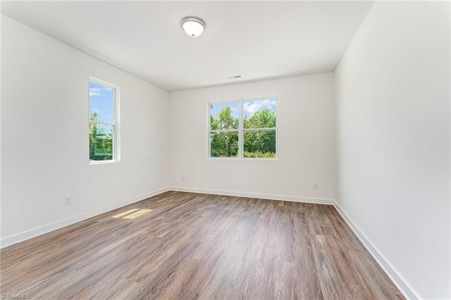 4000 Groometown Rd, Greensboro, NC 27407 - spare room featuring wood finished floors and baseboards