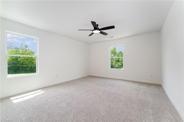 4000 Groometown Rd, Greensboro, NC 27407 - spare room featuring a ceiling fan and light carpet