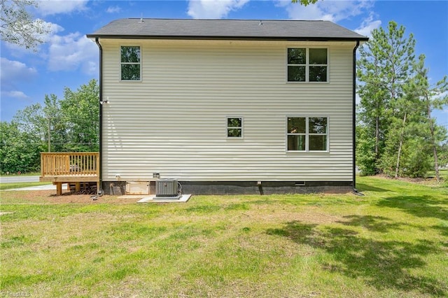 4000 Groometown Rd, Greensboro, NC 27407 - view of property exterior featuring crawl space, a deck, and a lawn