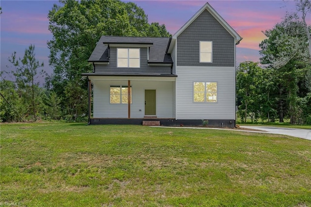 4000 Groometown Rd, Greensboro, NC 27407 - view of front of home featuring a front lawn, crawl space, and covered porch