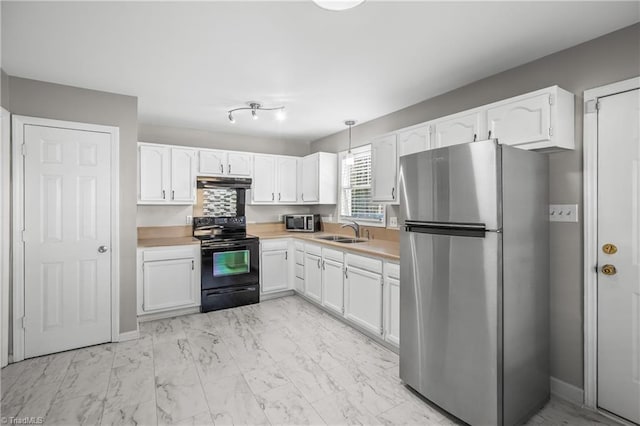 kitchen featuring marble finish floor, stainless steel appliances, white cabinets, a sink, and under cabinet range hood