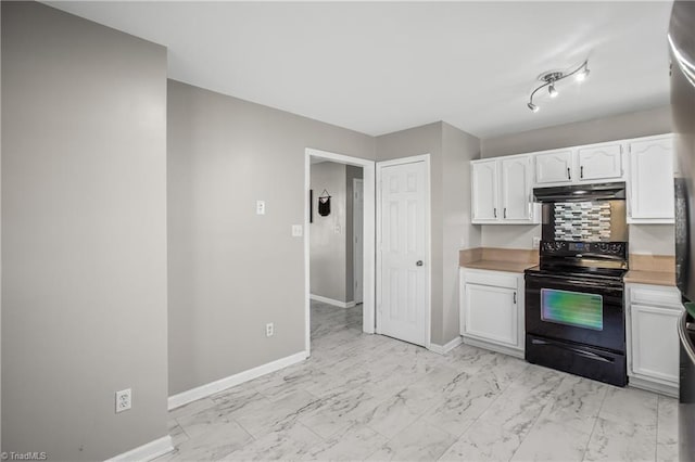 kitchen featuring marble finish floor, black range with electric cooktop, white cabinets, and under cabinet range hood