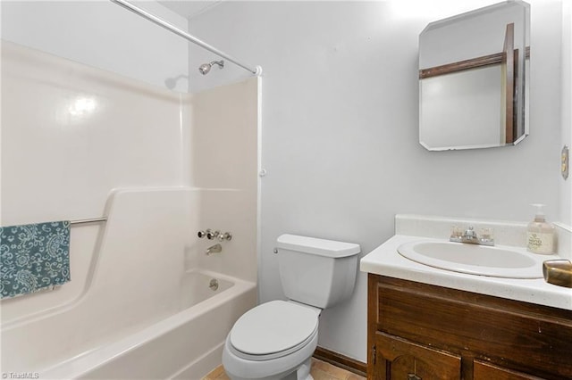 full bath featuring toilet, bathtub / shower combination, and vanity