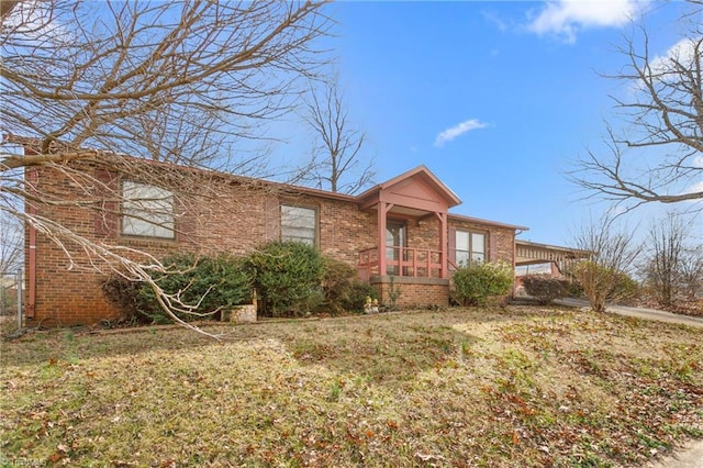 ranch-style home with brick siding