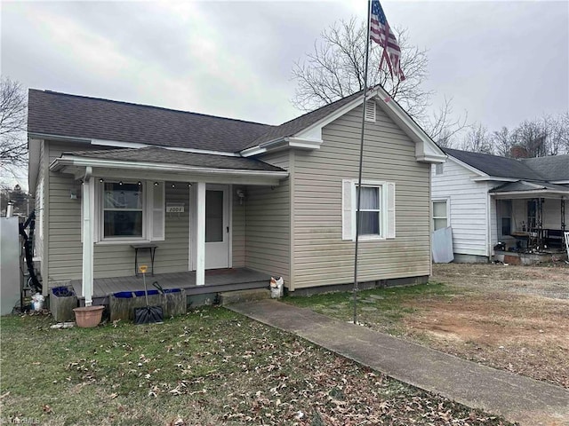 view of front of home featuring covered porch