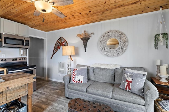 living room featuring heating unit, wood ceiling, and dark hardwood / wood-style floors