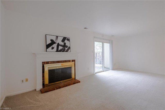 living room with a fireplace and carpet flooring