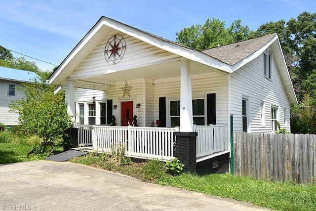 317 Louise Ave, High Point, NC 27262 - view of front facade with covered porch and a shingled roof