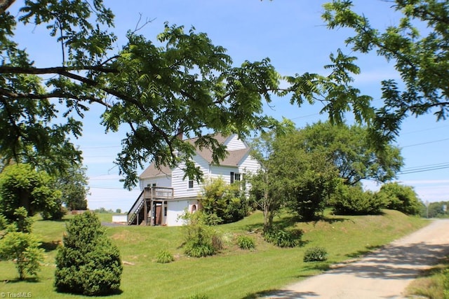 2289 W Pine St, Mount Airy, NC 27030 - view of side of home with a yard and stairs