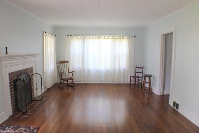 2289 W Pine St, Mount Airy, NC 27030 - living area with wood finished floors, a fireplace, crown molding, and baseboards