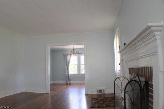 2289 W Pine St, Mount Airy, NC 27030 - living room featuring wood finished floors, a chandelier, crown molding, and baseboards