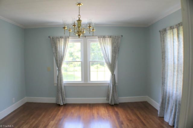 2289 W Pine St, Mount Airy, NC 27030 - empty room featuring a chandelier, ornamental molding, dark wood-style floors, and baseboards