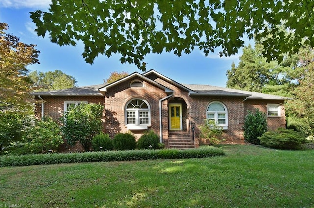 ranch-style house with a front yard