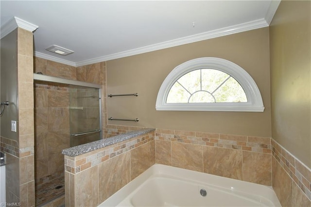 bathroom with crown molding and shower with separate bathtub