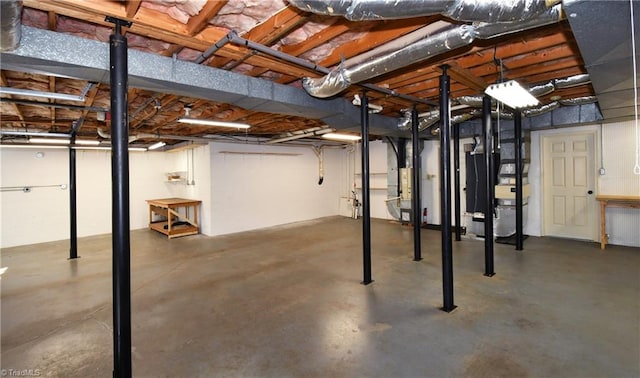 basement featuring heating unit