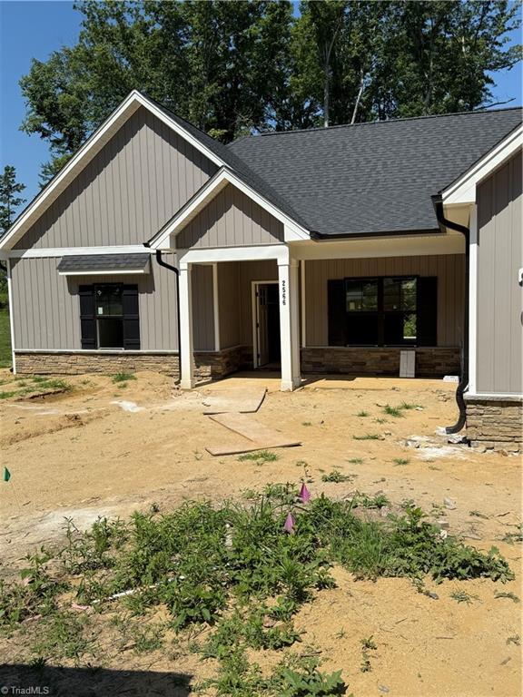 2566 NC Highway 801 S, Advance, NC 27006 - back of house featuring a shingled roof