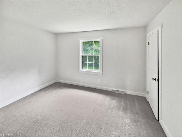 115 Wills Rd, Advance, NC 27006 - carpeted empty room featuring a textured ceiling and baseboards