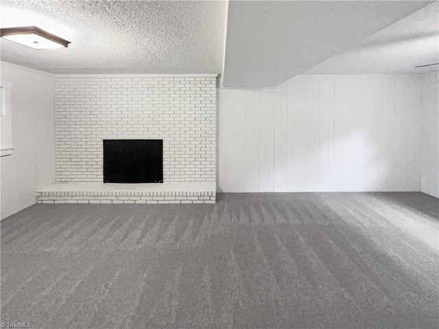 115 Wills Rd, Advance, NC 27006 - bonus room with carpet floors, a textured ceiling, and a fireplace