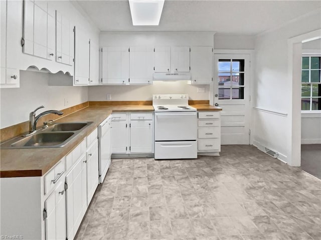 115 Wills Rd, Advance, NC 27006 - kitchen featuring white appliances, under cabinet range hood, a sink, white cabinetry, and plenty of natural light