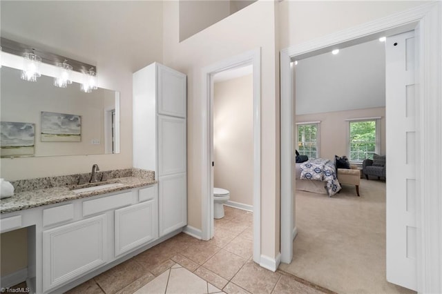 6303 Reata Ct, Summerfield, NC 27358 - bathroom with vanity and tile patterned flooring