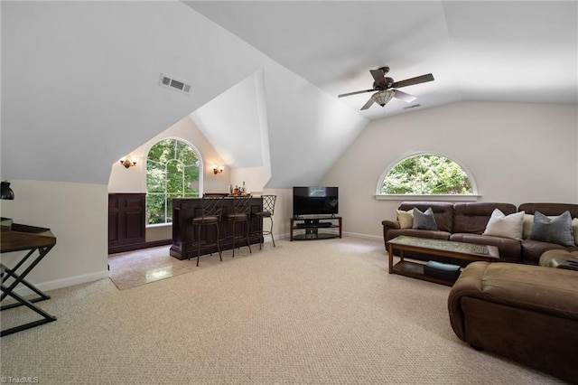 6303 Reata Ct, Summerfield, NC 27358 - living room with lofted ceiling, carpet flooring, and a ceiling fan