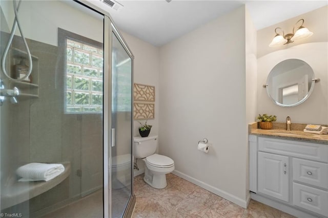 6303 Reata Ct, Summerfield, NC 27358 - bathroom featuring vanity and a shower with door