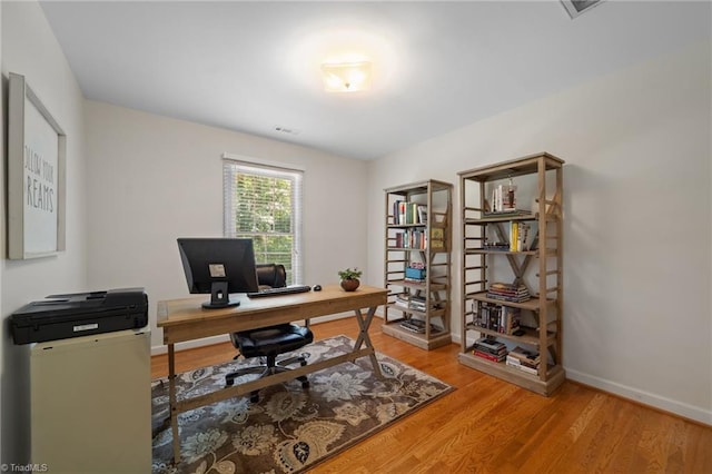 6303 Reata Ct, Summerfield, NC 27358 - office with light wood-style floors and baseboards