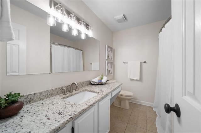 6303 Reata Ct, Summerfield, NC 27358 - bathroom with vanity and tile patterned floors