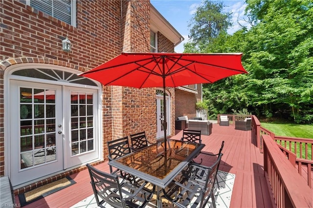 6303 Reata Ct, Summerfield, NC 27358 - wooden deck featuring french doors and outdoor dining space