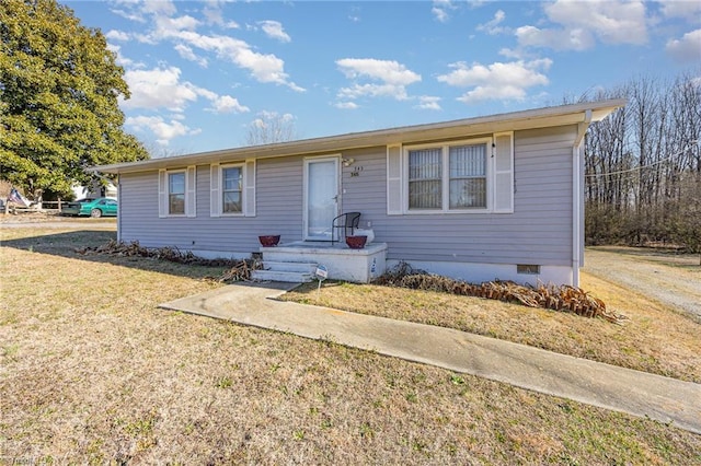 ranch-style home featuring a front yard and crawl space